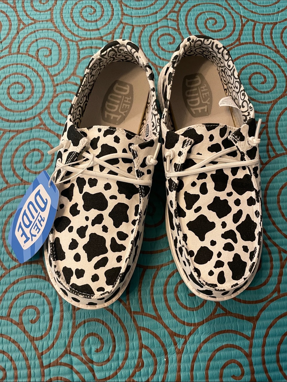 Hey Dude women’s Slip-On Cow Spot Canvas Shoes in Black and White Wendy milkyway